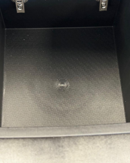 Interior view of the storage compartment in the Hannan 2 Seater Electric Recliner Sofa in grey micro fabric.