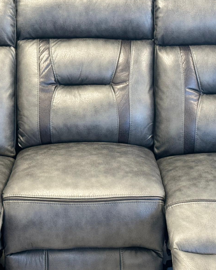 Close-up of the Nova 3 Seater Electric Recliner Sofa in Grey Aire Leather, showcasing intricate stitching and cushion details.