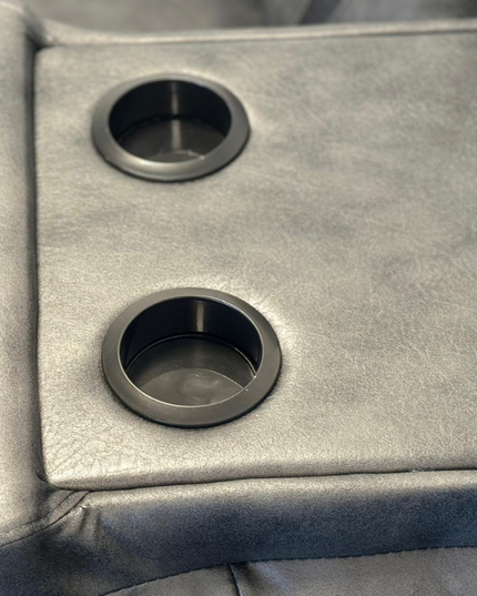 Close-up of cup holders on the Nova 3 Seater Electric Recliner Sofa in Grey Aire Leather.