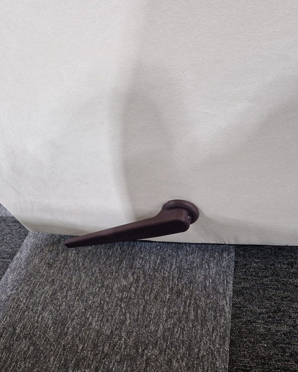 Close-up of the lever on a Munich Reclining Swivel Arm Chair, showcasing its functional design and upholstery.