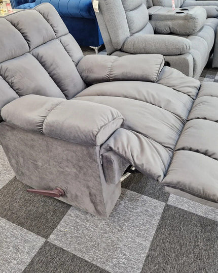 Munich grey reclining swivel arm chair with plush padding, perfect for comfortable lounging in living rooms.