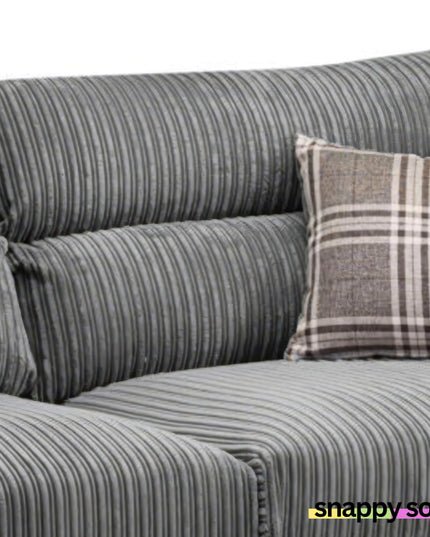 Close-up of Harley 3+2 Fabric Sofa in plush grey jumbo cord with checkered cushion, showcasing comfort and style.