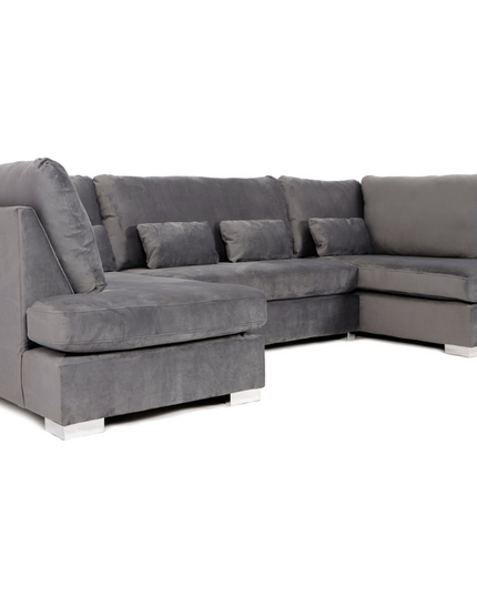 Belgravia U Shape Sofa in plush velvet upholstery, featuring deep cushions and stylish chrome feet.