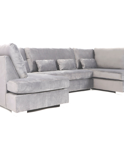 Belgravia U Shape Sofa in plush velvet, featuring deep cushions and sleek chrome feet, perfect for luxury living.