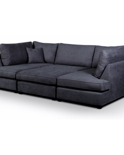 Carnaby Small U Shape Sofa in dark gray with footstool, designed for style and comfort in modern living spaces.