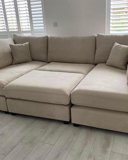 Carnaby Small U Shape Sofa in soft beige fabric, designed for style and functionality with ample seating.