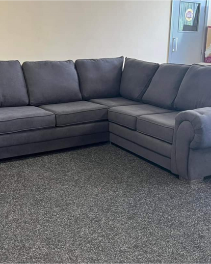 Chicago Corner Sofa Bed in grey fabric, featuring a spacious L-shape design ideal for modern living rooms.