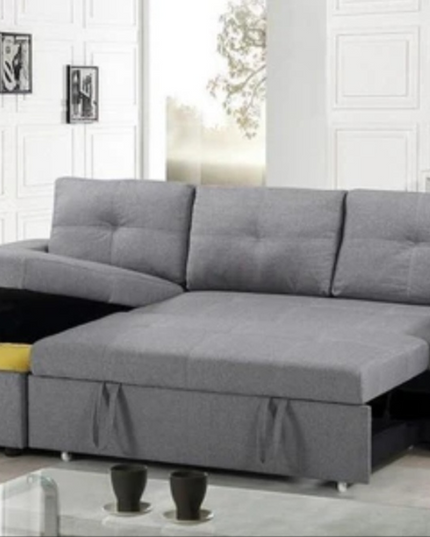 Veronica pull-out sofa bed in grey linen with storage and reversible chaise for versatile living spaces.