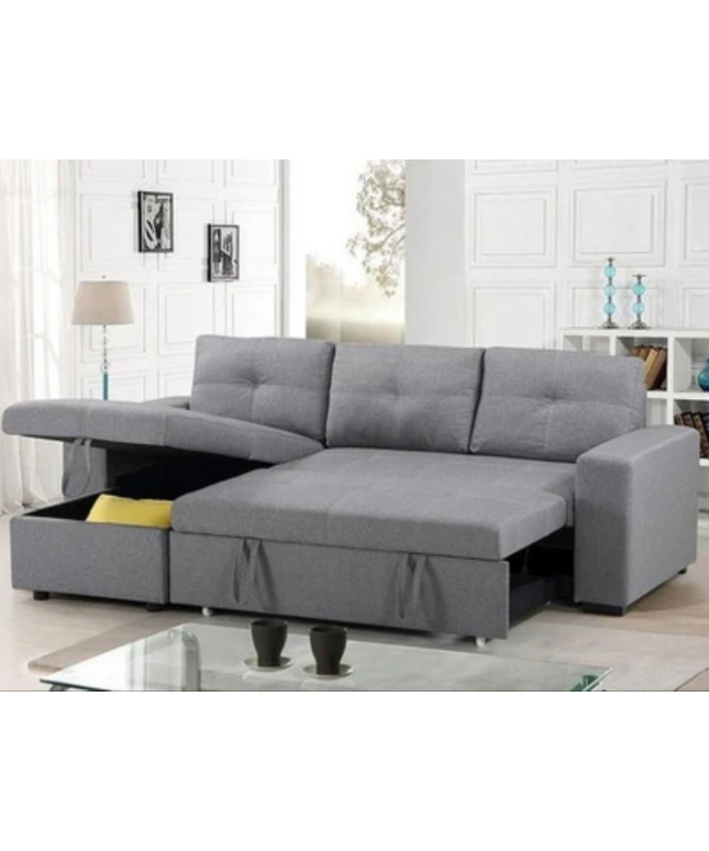 Veronica pull-out sofa bed in grey linen with storage and reversible chaise for versatile living spaces.