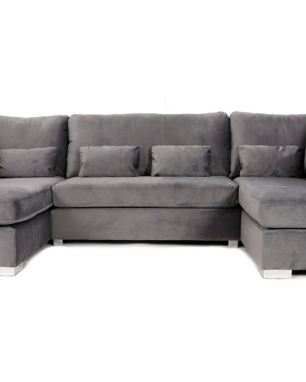 Belgravia U Shape Sofa in plush gray velvet with deep cushions and chrome feet, perfect for luxury living and comfort.