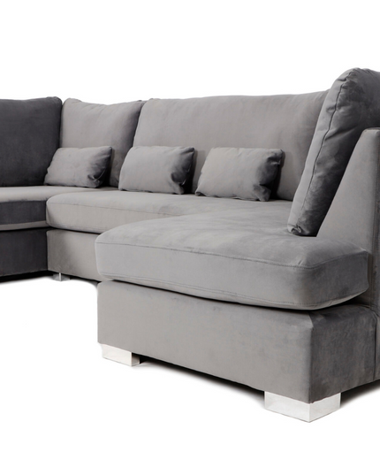 Belgravia U Shape Sofa in plush velvet with deep cushions and chrome feet, offering luxury and comfort.