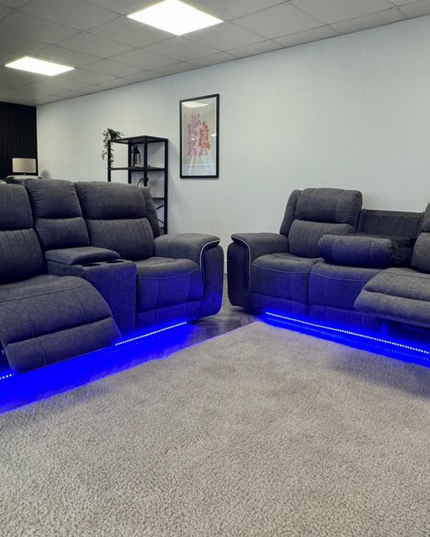 Hannan 3+2 Electric Recliner Sofa Set in grey micro fabric with blue LED base, showcasing modern comfort and design.