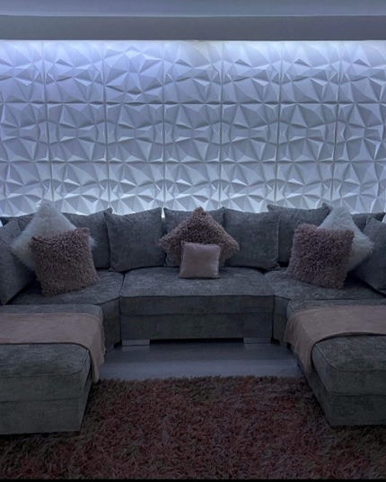 London U Shape Sofa Soft Chenille with plush cushions and modern design, set against a stylish illuminated background.