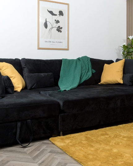 Meridian U Shape Sofa Bed in black plush velvet with hidden storage and colorful cushions, perfect for modern living.