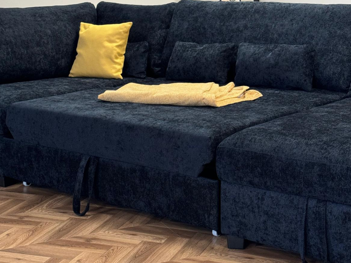 Meridian U Shape Corner Sofa Bed with Storage in Black Alaska Chenille