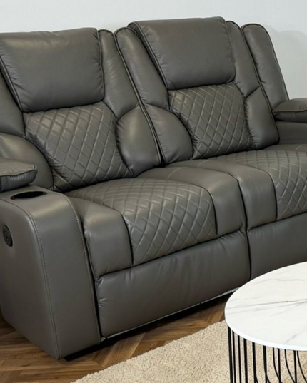 Orlando 2-seater electric recliner sofa in grey leather with cupholders and quilted design.