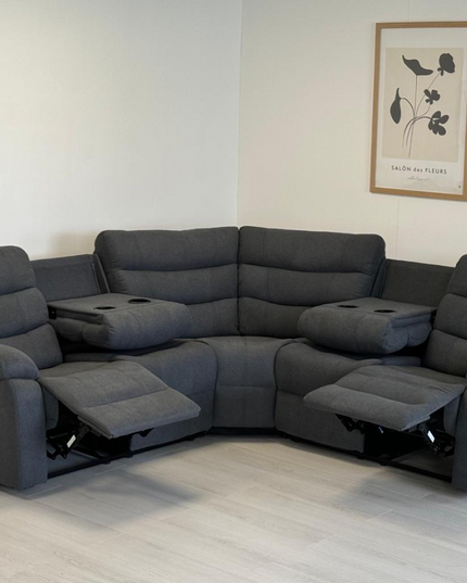 Sorrento Corner Recliner Sofa in grey fabric with reclining seats, perfect for comfortable lounging in a stylish living room.