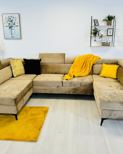 Sovereign U shape pull-out sleeper sofa in plush velvet with cozy yellow accents and modern design.