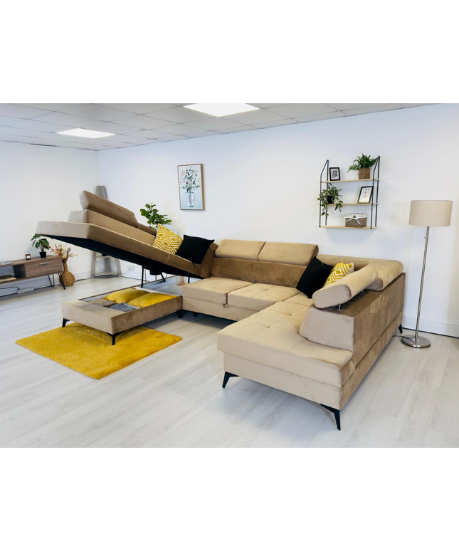 Sovereign U-shaped pull-out sofa in plush velvet with storage in a modern living room setting.