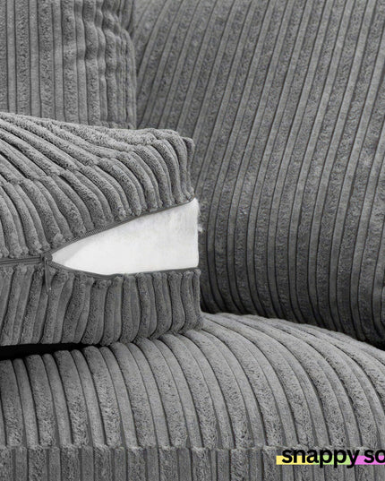 Close-up of plush grey cord upholstery on the Harley 3+2 Fabric Sofa, showcasing its soft and cozy texture.