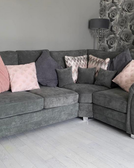 Vegas Corner Sofa 4-seater in grey with decorative cushions, perfect for cozy living spaces.